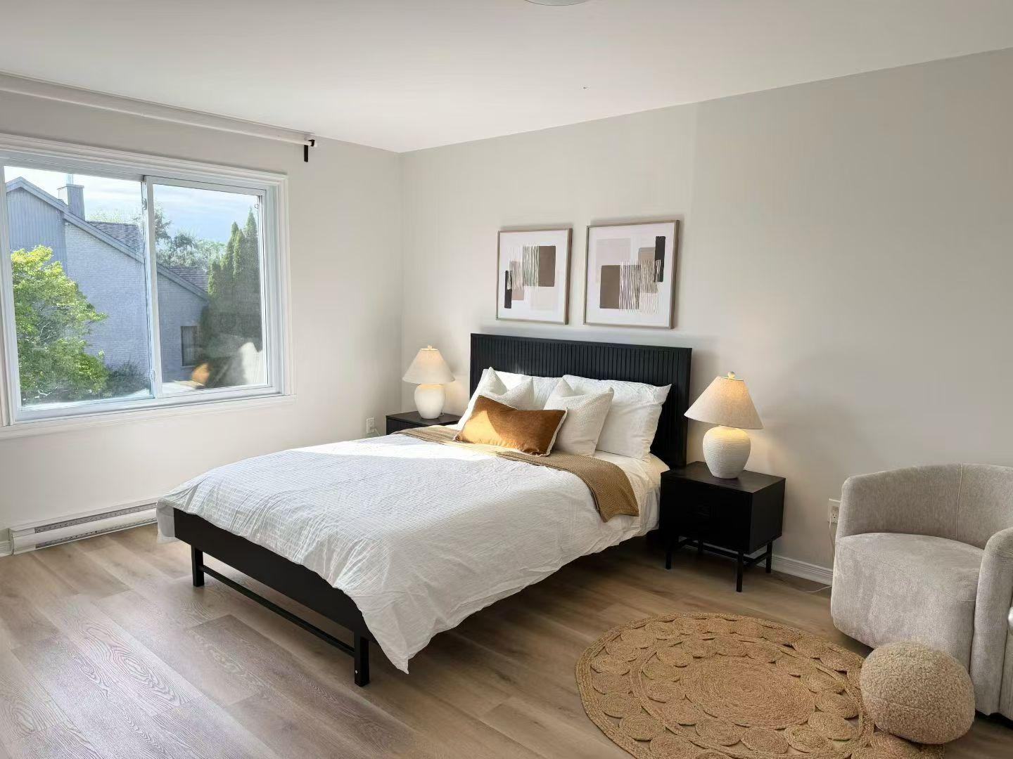 Soft-furnished primary bedroom